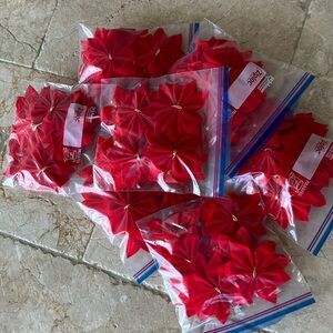 7 dozen Christmas poinsettias-red fabric/felt